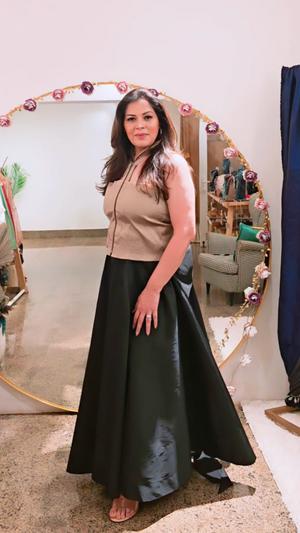Celestia taffeta circular skirt with pin-tucked top and statement bow belt from the Noorè collection