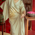 Gilded golden Dola silk kaftan top with long side panels and draped skirt with gold foil work