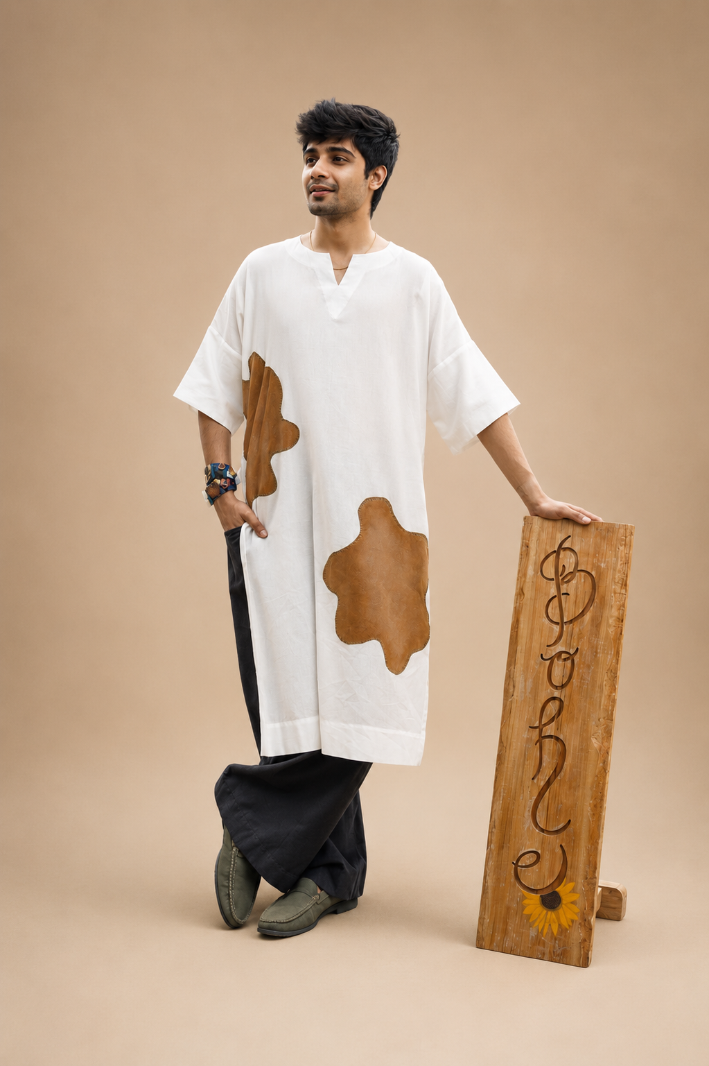 Long kimono-style kurta with jute patchwork paired with wide-leg pants, featuring a relaxed artisanal silhouette by Bohe by NAM.