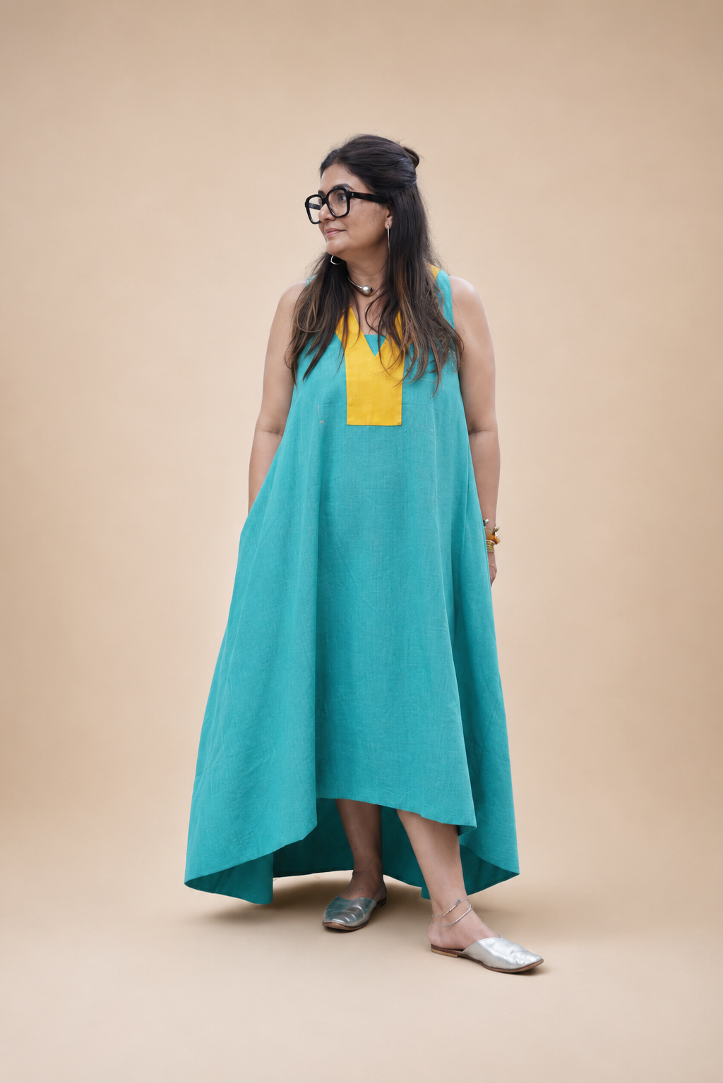 High-low tunic featuring a contrasting jute high collar, relaxed silhouette, and contemporary artisanal detailing by Bohe by NAM.