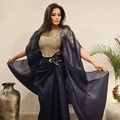 Ethereal navy blue taffeta drape skirt with gold-worked bustier and shimmer organza cape from Noorè