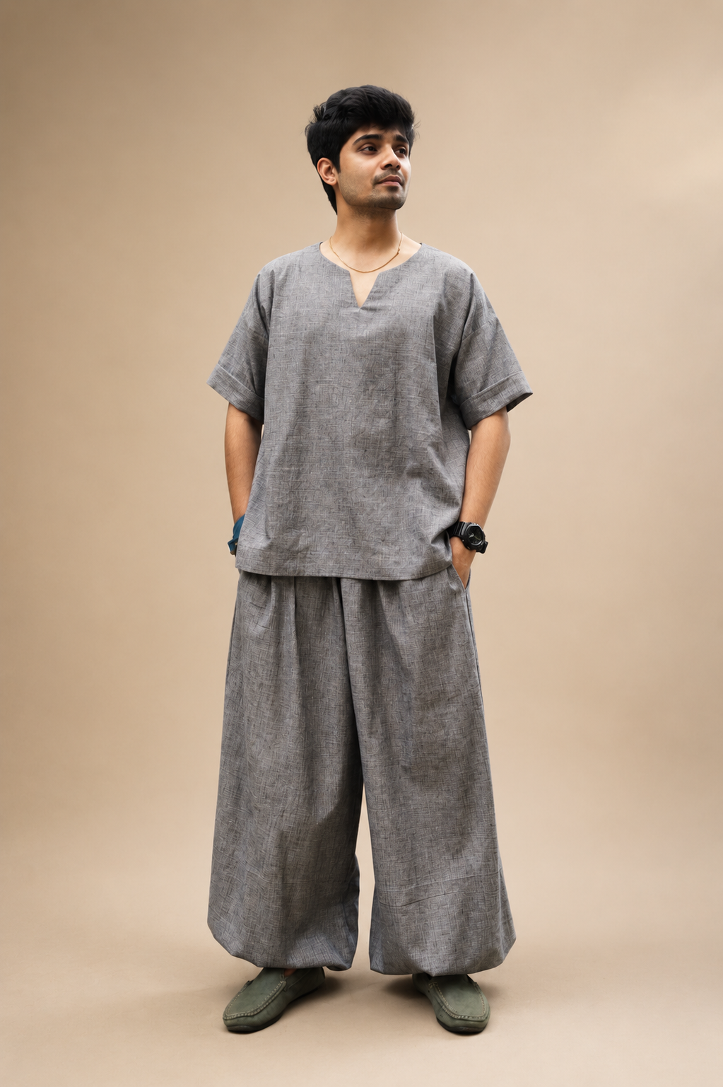 Gathered wide-leg pants paired with a short kurta featuring artisanal detailing and a relaxed contemporary silhouette by Bohe by NAM.