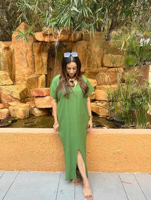 Bohemian
style linen
cowl dress
with soft
drape And front slit